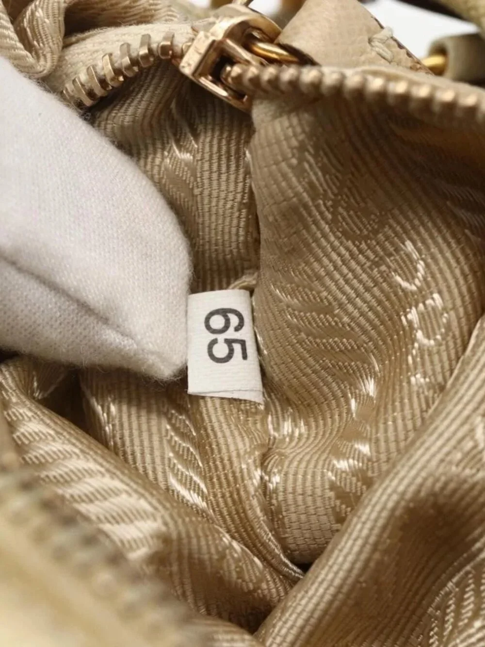 Prada brand	prada color	beige